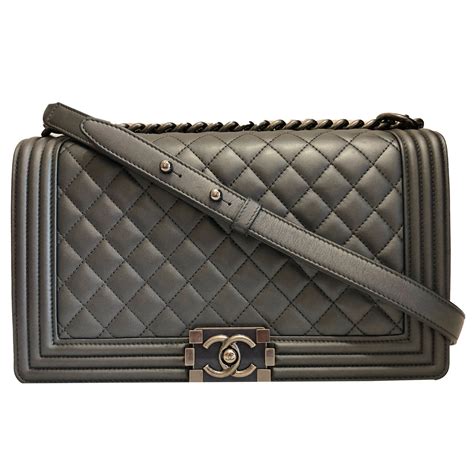 boy chanel flap bag with handle|Chanel boy bag inside.